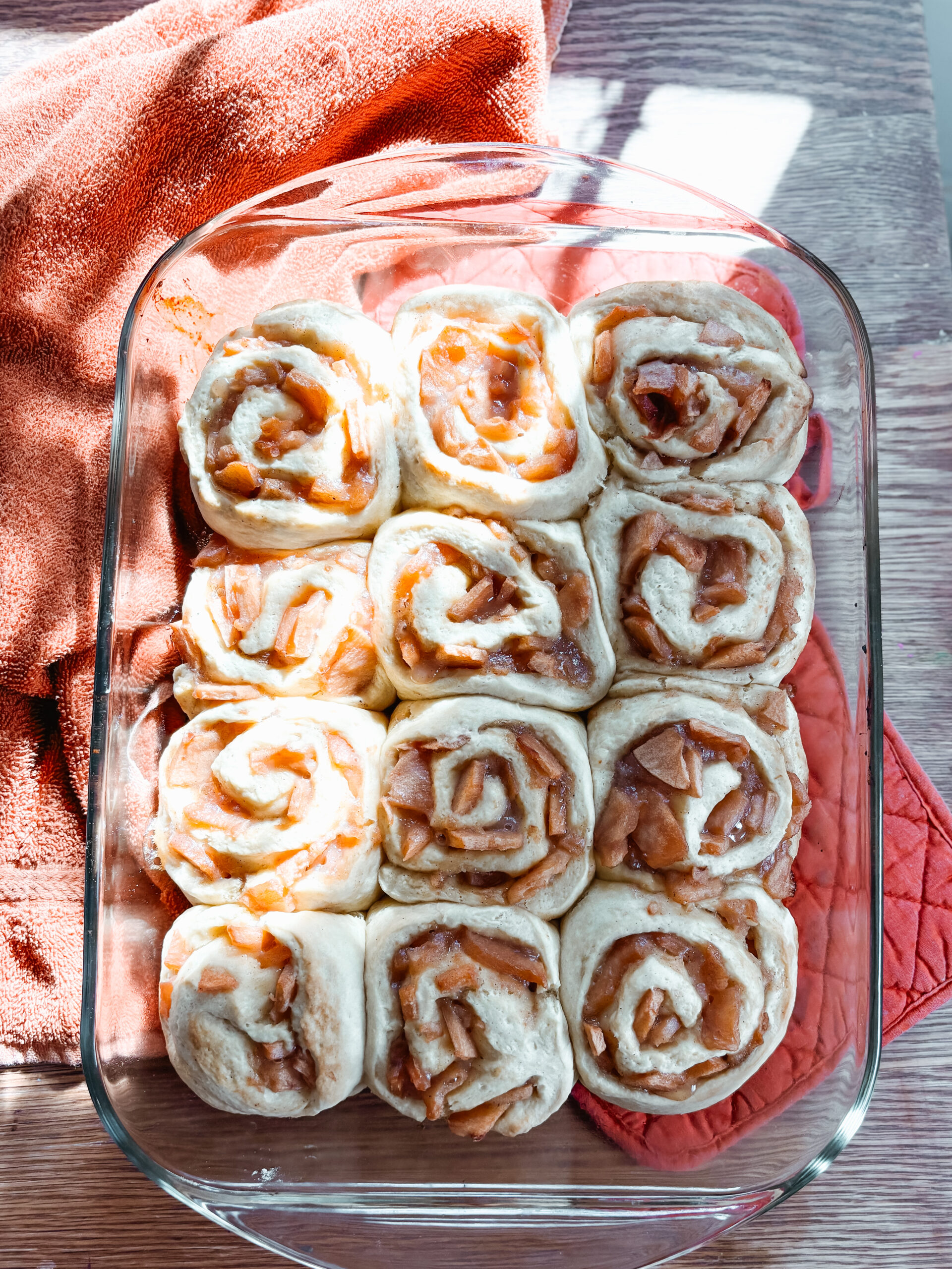 Cooked sourdough discard apple pie cinnamon rolls before cream cheese frosting