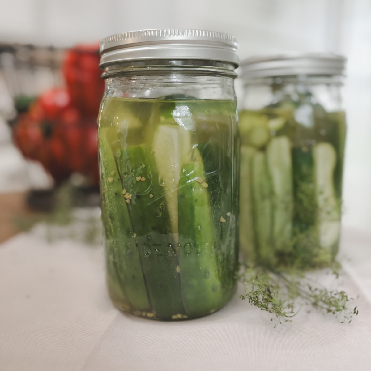 Featured image for homemade canned dill pickle cucumbers in jars