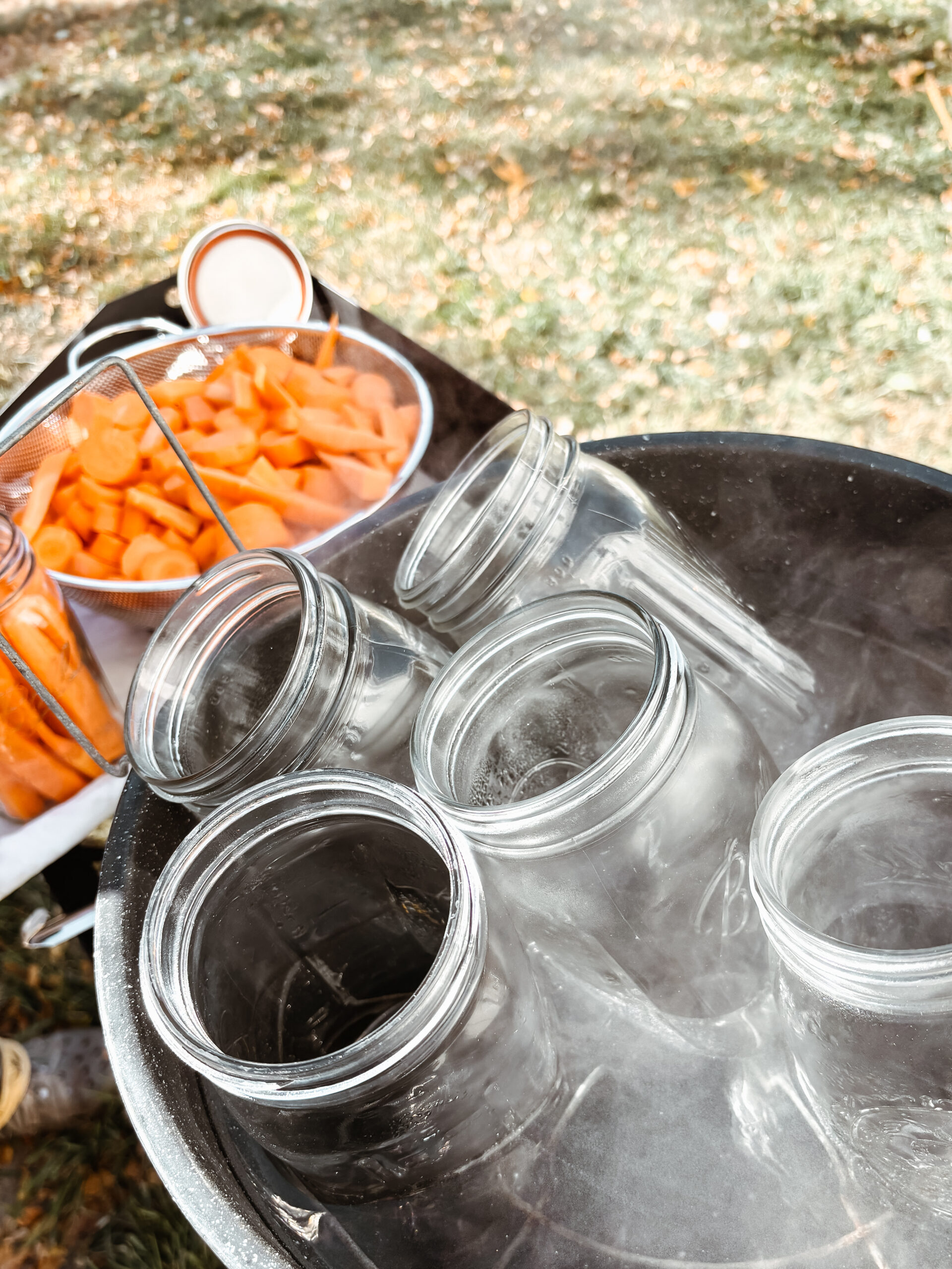 Outdoor canning set up for canned carrots