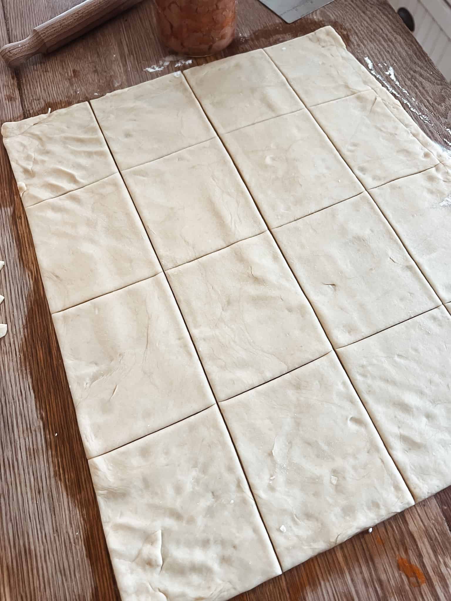 sourdough discard apple turnovers step 3, cut the turnover dough to size