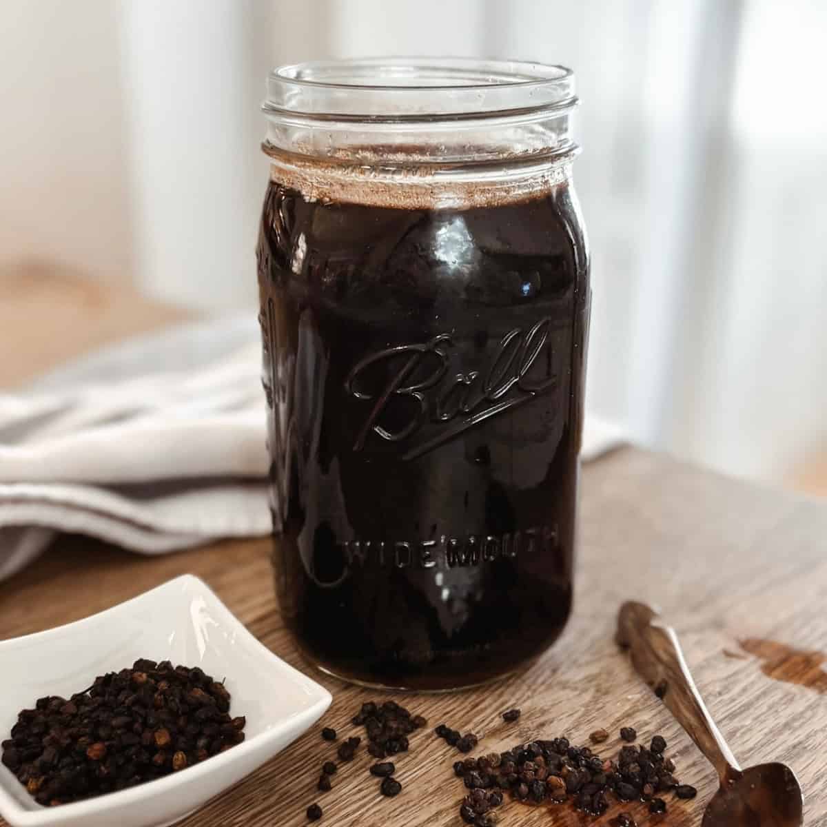 Homemade elderberry honey syrup for a natural immune support featured image