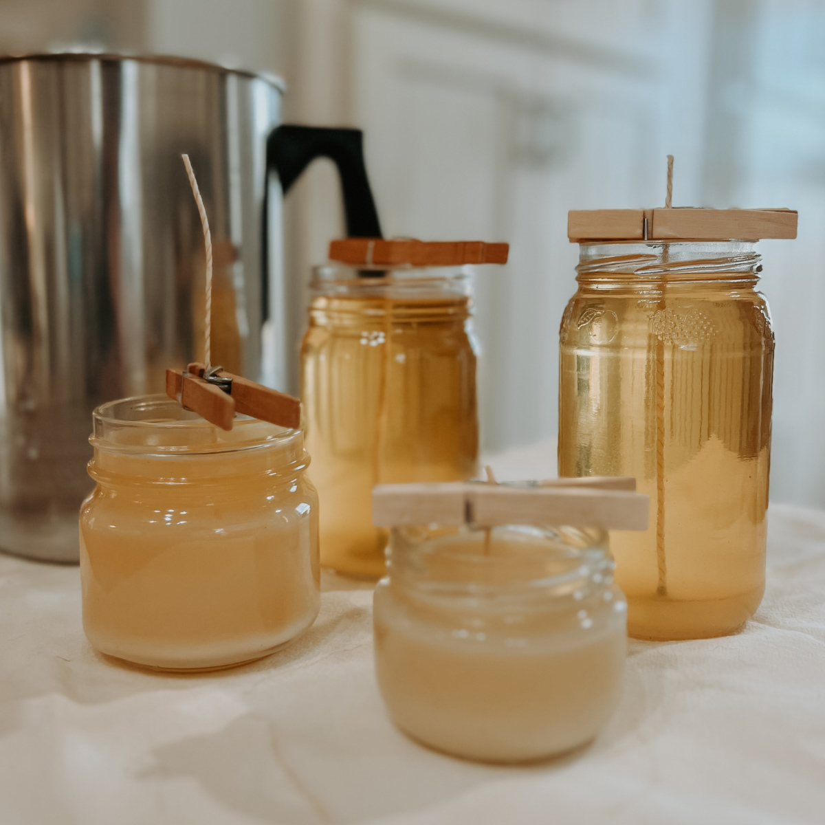 Featured Image Beeswax Candles in glass jars homemade